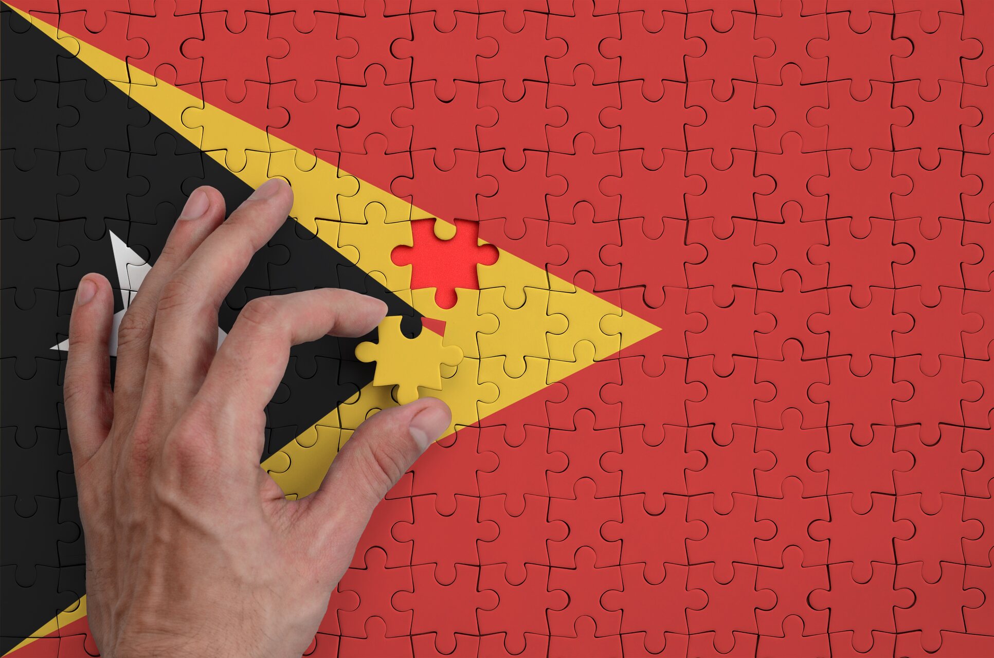 Timor Est: una bandiera composta come un puzzle rappresenta la costruzione di un’identità nazionale