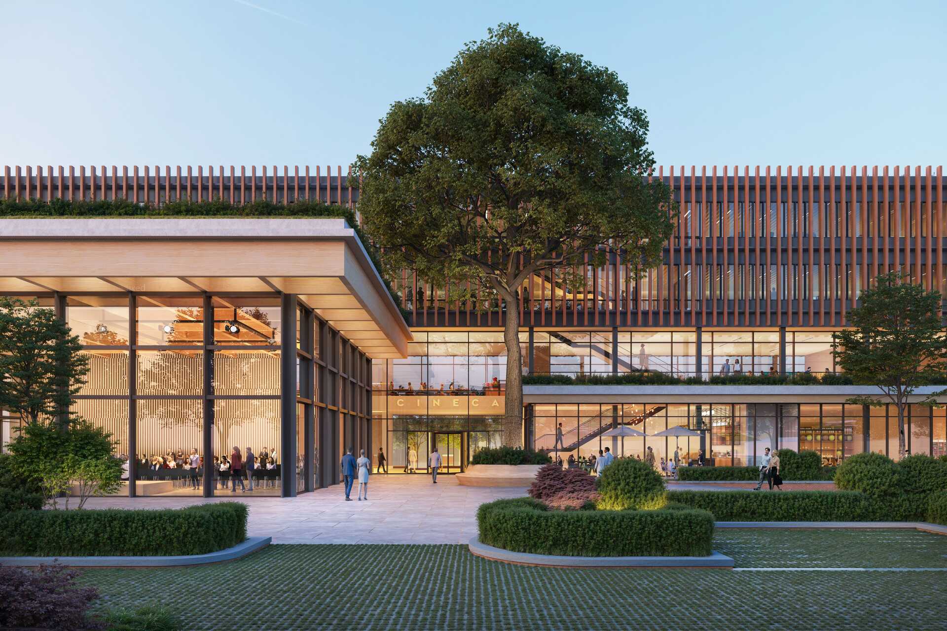 Campus CINECA: interni luminosi e aree comuni di un edificio progettato per ricerca, formazione e collaborazione, con attenzione a benessere, flessibilità degli spazi e rapporto con il verde urbano AI